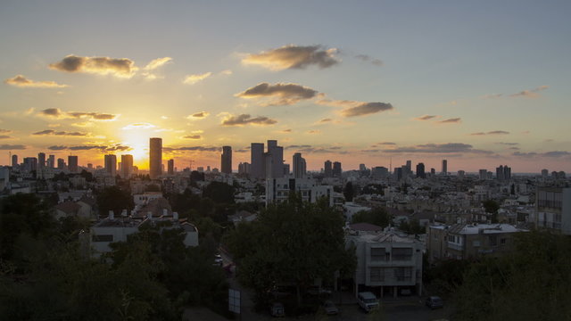 City skyline time lapse sunset to night