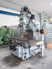 Drilling and milling CNC in workshop