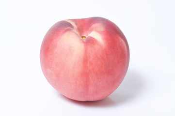 Peach close-up on white background