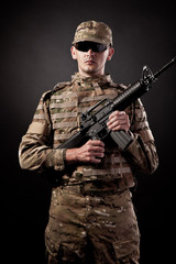 Modern soldier with rifle