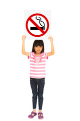 Little girl holding a no smoking sign