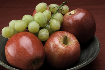 Close up of apples and grapes.