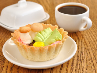 small cake basket on a brown table