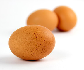 Three brown eggs