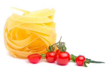 spaghetti and ripe tomatoes, isolated over white background