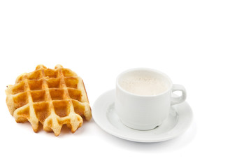 cappuccino in a cup and wafers