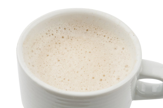 frothy cappuccino in a cup