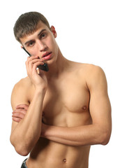 Fototapeta premium Young Sexy Man with a Cell Phone