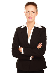 A beautiful woman standing with her arms crossed