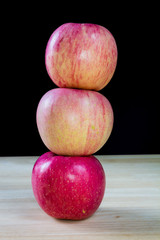 Stack of three apples