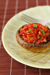 Champignon stuffed with tomatoes and bell peppers