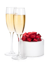 Champagne glasses and gift