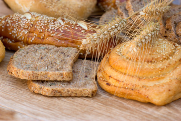 Various bread and pastry on the table