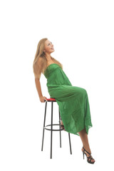 blond young woman in high chair smiling