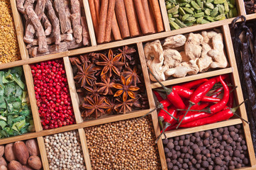 spices and herbs in wooden box