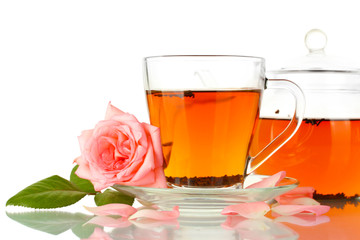 teapot and cup of tea with rose isolated on white