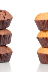 Fresh muffins isolated on white