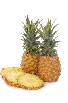Ananas and cut of isolated on white