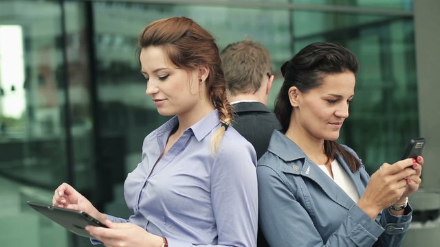 Business people using laptop, tablet and cellphone in the busine