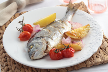 Baked sea bream with vegetables