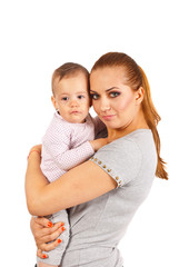 Mother embracing crying baby