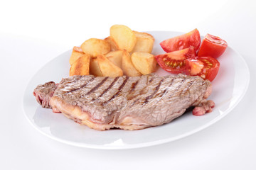 isolated plate of grilled beef and vegetable