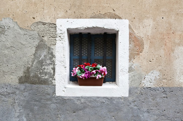 Fototapeta na wymiar Old window in Italian town