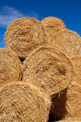 Rround bales of straw in a stack