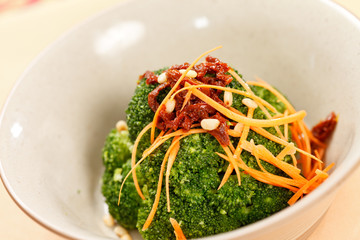 broccoli with carrot and dried tomato