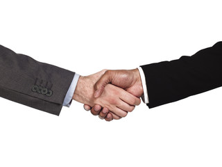 cropped image of business people shaking hands