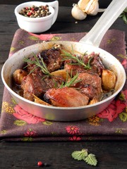 Meat baked with garlic and rosemary