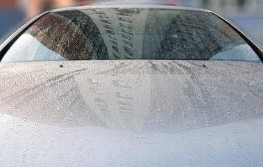 Raindrops on a car surface