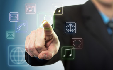 Businessman pressing application button