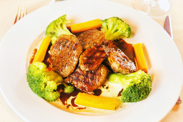 Plate with roasted lamb