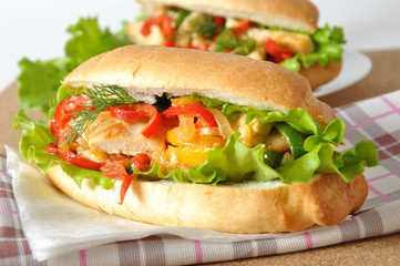 Grilled chicken sandwich with paprika and lettuce 