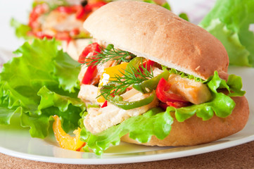 Grilled chicken sandwich with paprika and lettuce 