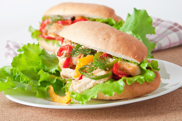 Grilled chicken sandwich with paprika and lettuce 