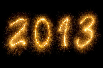 2013 written in sparkling letters on black background