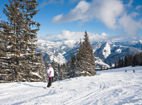 Alpine skier mountains in the background