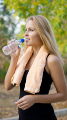 Athlete drinking bottled water