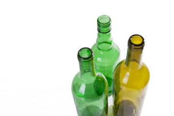 three empty wine bottles