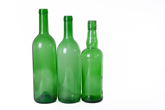 three diffetent empty bottles