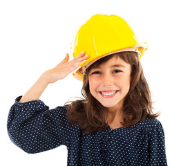 Little girl wearing yellow helmet salute