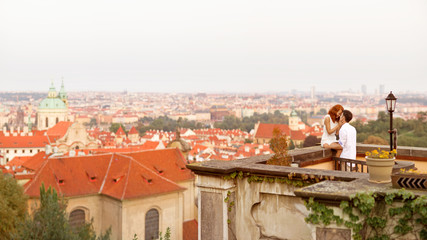 Young couple walking in old town of Prague