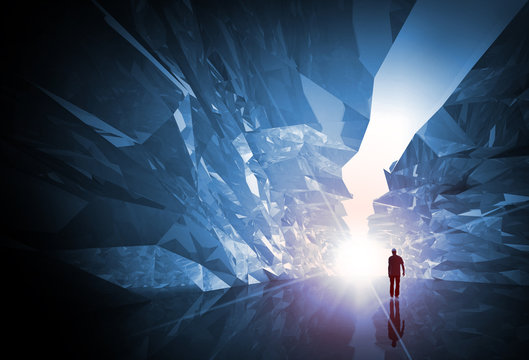 Man walks through the fantasy crystal corridor with glowing end