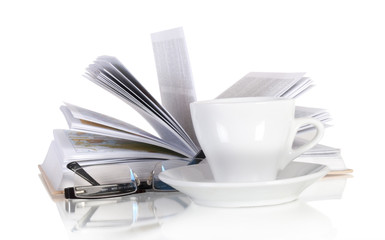 White cup of coffee, open book and glasses