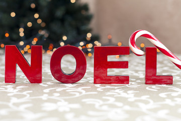 noel word and candy cane