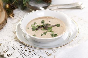 Traditional polish mushroom soup with cream and vegetables
