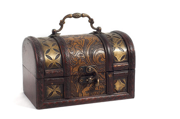 wooden chest with golden ornaments isolated on white background