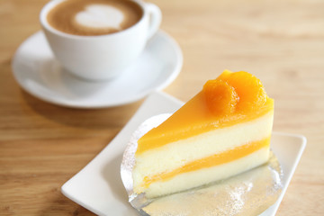 Orange cake on wood background